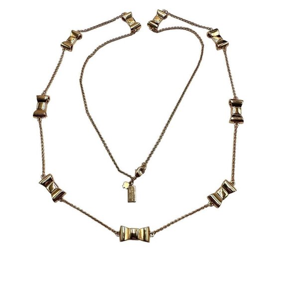 Designer Kate Spade Gold Tone Bow Tie Station 28 Inch Necklace - Picture 1 of 3